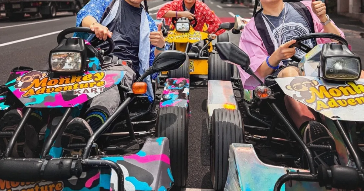 Go-kart driving past Tokyo Tower on a Tokyo Tower and Shibuya Crossing premium go-kart tour in Tokyo, Japan