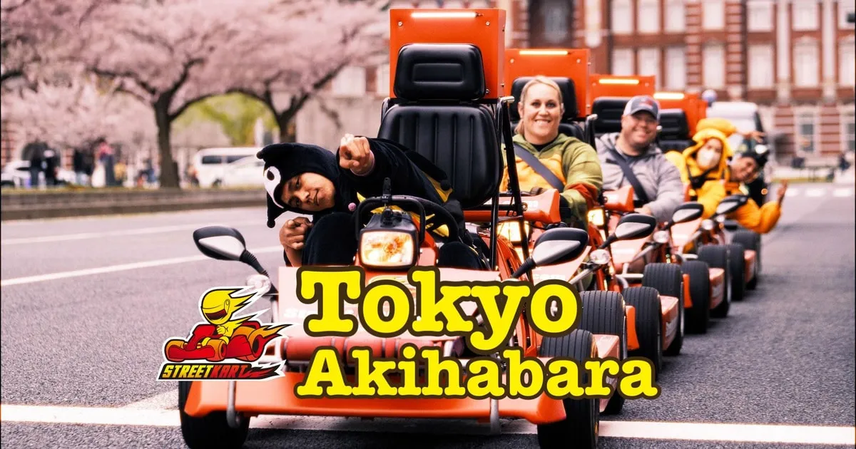 Character-costumed driver on a go-kart outside Akihabara on the Akihabara original go-kart tour in Chiyoda City, Tokyo, Japan