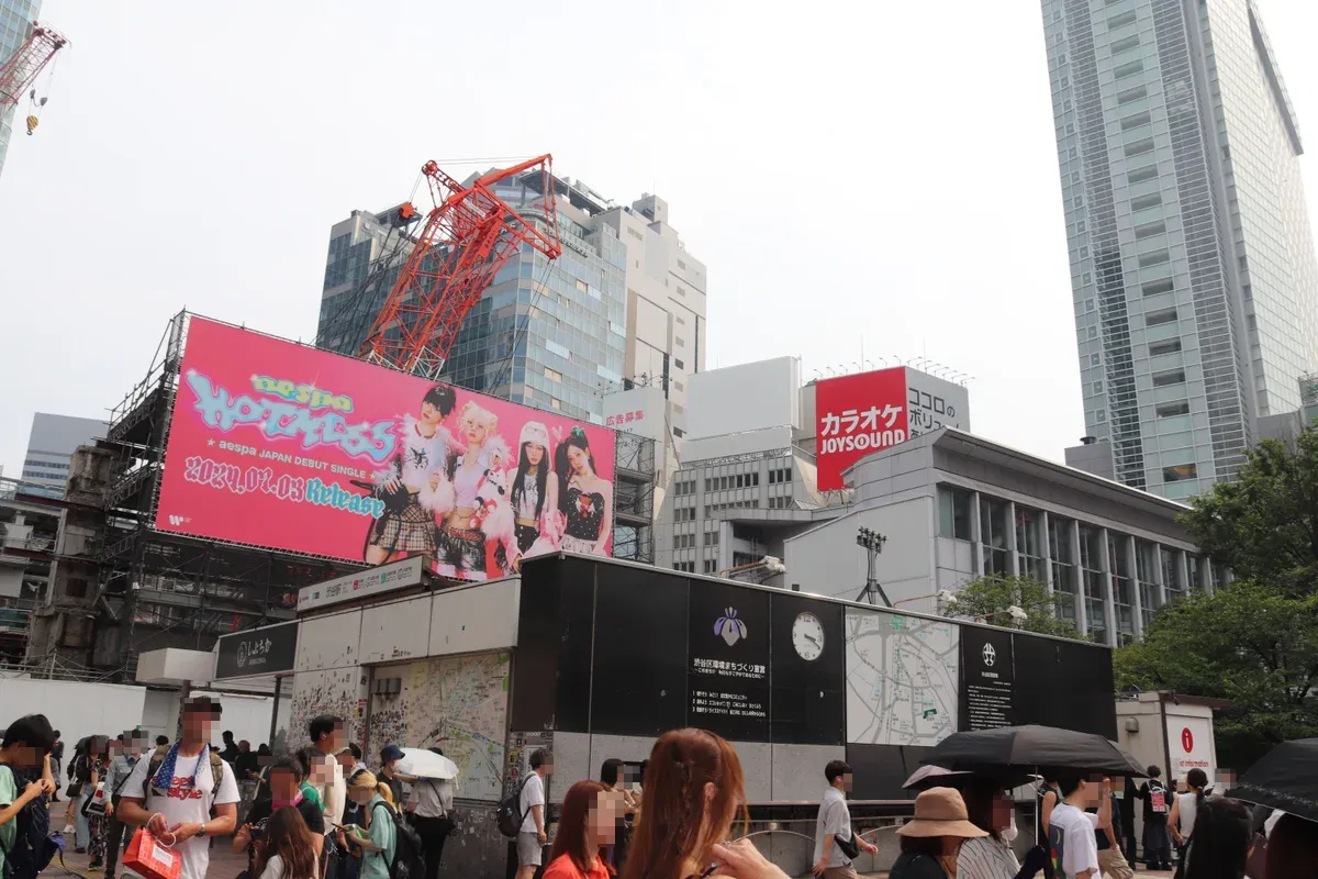 Street by Shibuya Station Hachiko exit where go-kart riders walk to check-in in Shibuya, Japan